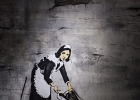 20211116-IMG 2783  Banksy - La servante de Londres -  Londres - Royaume Uni - 2006 - The Word of Banksy -  Paris 9eme - France - le 16/11/2021 : PARIS, STREET ART, STREET ART-BANKSY